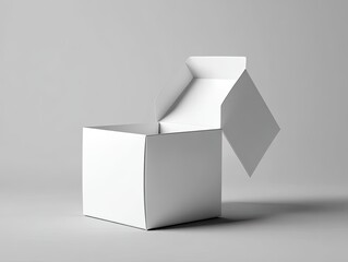 Opened white square box with top flaps against gray background
