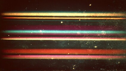 Abstract image of horizontal glowing color bands on dark, grainy surface