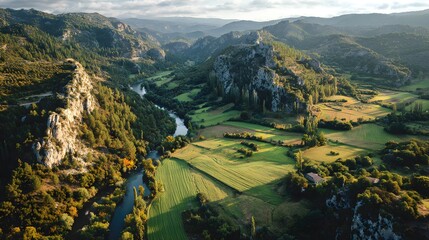 Majestic River Valley Landscape with Lush Greenery and Rocky Cliffs at Sunrise.