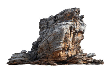 Isolated rock formation, a craggy, textured mound of light gray and tan stone