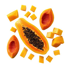 Vibrant papaya slices and cubes arranged in a scattered pattern against a black background