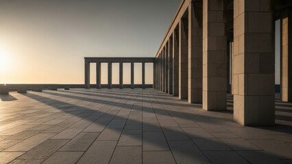 Obraz premium A serene and peaceful ancient stone structure with columns at sunset