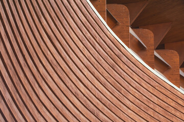 Abstract architecture. Close up of a wooden building facade.