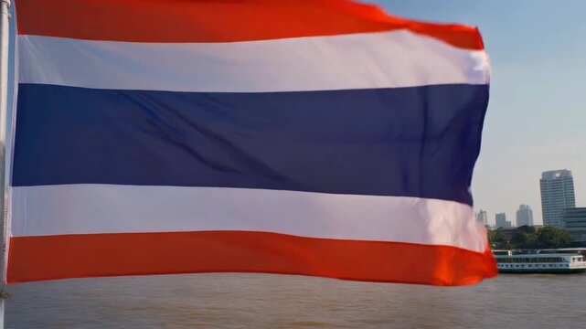 National Flag of Thailand snapped taut by strong wind showing dramatic fabric tension, cinematic 4K render.