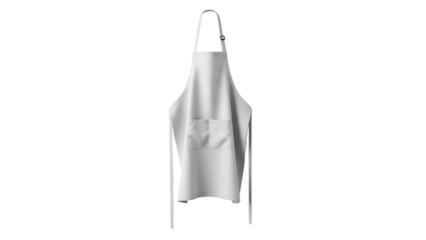 A pristine white apron hangs against a stark black background in a studio setting, simplistic.