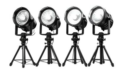 Four black spotlights on tripods, illuminating forward. Focused, angled, and bright