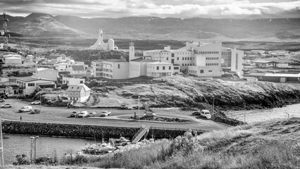 Scenic aerial shot of Stykkisholmur Iceland featuring colorful houses and coastal landscape