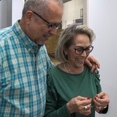 Senior couple having good time together at home. Hapiness.