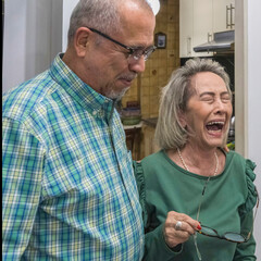 Senior couple having good time together at home. Hapiness.