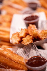 Delicious long fried churros with a crunchy texture, perfect for a sweet treat or street food dessert