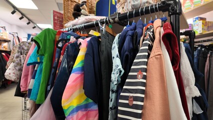 Clothes inside a charity shop in UK