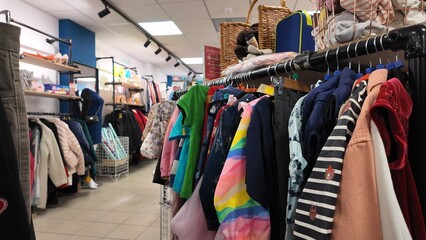 Clothes inside a charity shop in UK