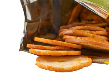 Close-up view of bread crisps inside an opened package. Detailed food texture and crunchy baked slices, suitable for snack branding, packaging design, and retail visuals.