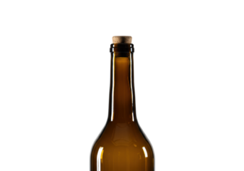 single premium dark amber glass wine bottle, heavy gauge, cork-sealed, dramatically lit close-up against a transparent background (copy space) emphasizing form and clarity. High-end design concept