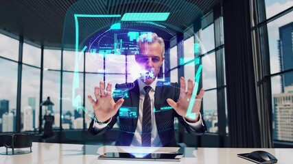 A businessman works with a virtual digital interface in a modern office. Future technologies, visualization in holograms - Powered by Adobe