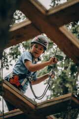 Little Girl Climbing Obstacles at Adventure Park &ndash; Active Childhood Experience