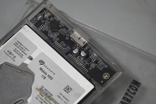 Close-up of a Seagate Mobile HDD circuit board and storage device.