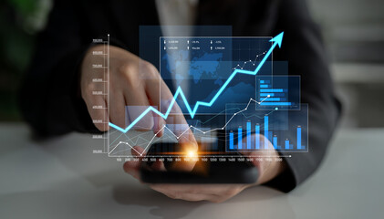 Business professional uses smartphone to analyze financial data, featuring graphs and charts that illustrate market growth trends and strategic insights. Scalp
