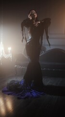 Gothic femme fatale portrait featuring a woman in black godet dress with corseted waist, long straight hair, and dramatic makeup in opulent dimly lit gothic surroundings.