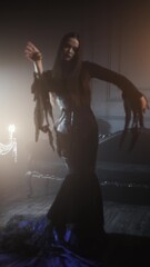 Gothic femme fatale portrait featuring a woman in black godet dress with corseted waist, long straight hair, and dramatic makeup in opulent dimly lit gothic surroundings.