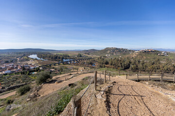 Landscape view of the ancient historic Roman bridge over the Guadiana river in Medellin Spain, a Spanish municipality in the province of Badajoz, in the autonomous community of Extremadura Spain.