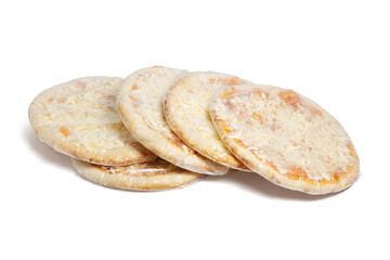 five frozen pizzas wrapped in nylon isolated