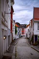 Obraz premium Street of Bergen Norway 25.07.2025 Cozy little multi-colored european houses.
