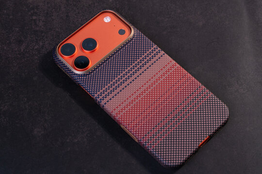 28.12.2025 - Kyiv, Ukraine: Orange Apple Iphone 17 Pro Max in orange Pitaka case