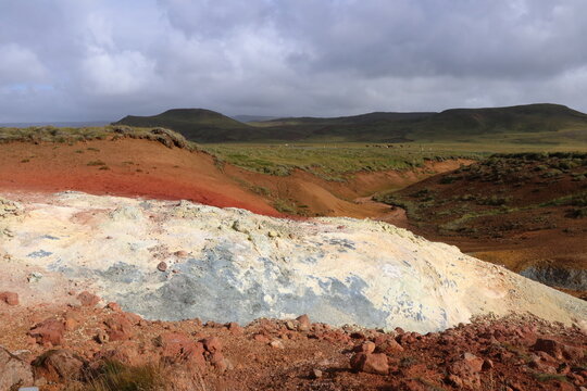 Multicolored Volcanic Terrain with Mineral Deposits