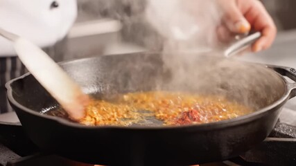 Chef Stirring Spices in Frying Pan, Cooking Food on Stove