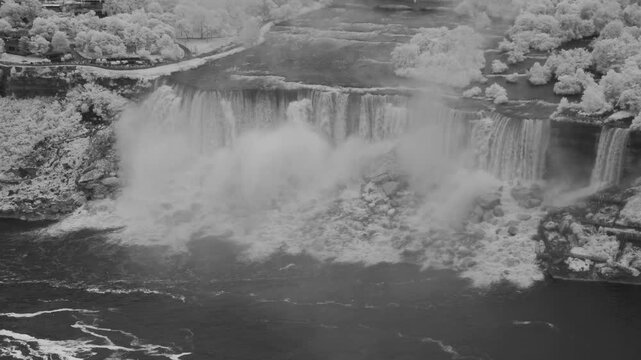 Stunning infrared aerial view of Niagara Falls with dramatic contrast in natural scenery