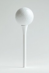 White golf ball positioned on a white tee against a plain background.