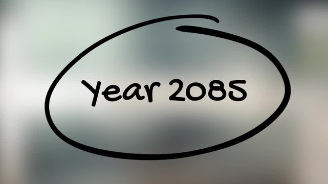 Year 2085 Handwriting with Black Marker on Glass Surface