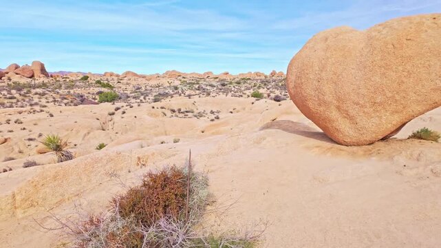Naturally formed granite boulder shaped like a heart located along a spur trail off Arch Rock Trail in Joshua Tree National Park California