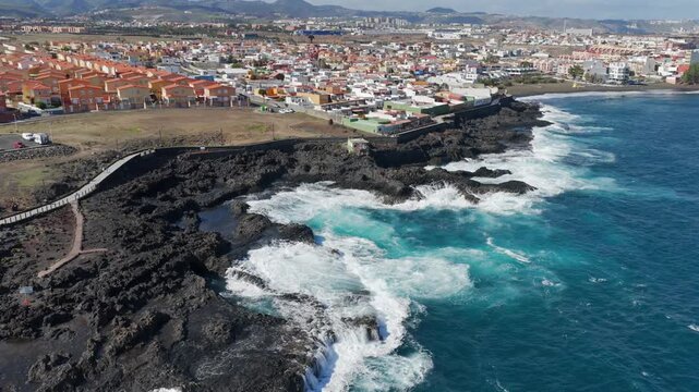 Volcanic Hydro-Explosion: 4K View of the Atlantic Ocean Surging Through the Basaltic Blowholes of El Bufadero de la Garita, Gran Canaria, Canary Islands, Spain