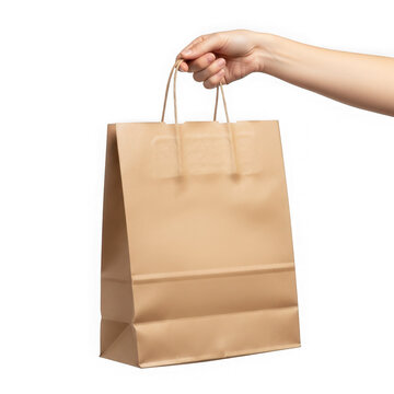 Hand holding brown paper bag isolated on transparent background