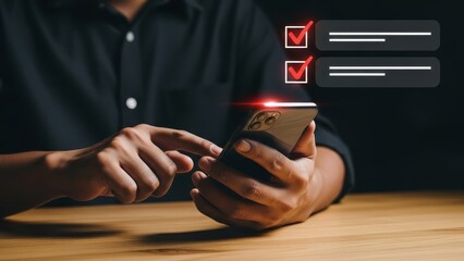 Person using a smartphone to check and complete online tasks or to-do list