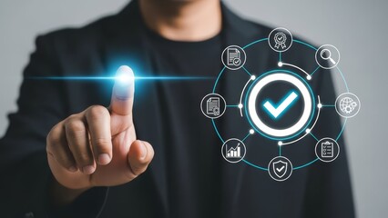 Person in dark clothing interacts with a digital security checkmark interface on a touchscreen screen