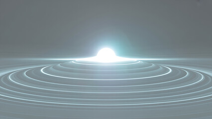 Vibrant glowing light in concentric circles on gray background