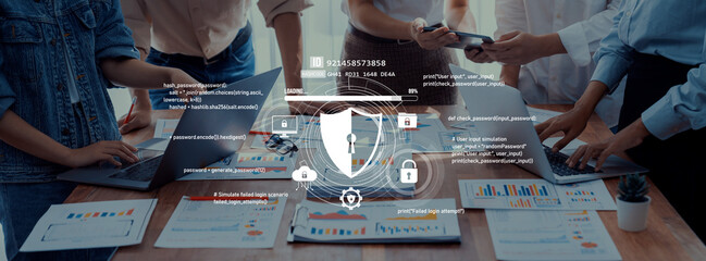 Team professionals engaged in a business meeting, using technology to analyze data and discuss cybersecurity strategies in a modern office setting. Trope