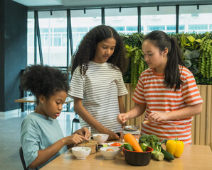 Group three children prepare healthy meal together in bright, modern kitchen. Surrounded fresh vegetable like bell pepper broccoli carrot engage in fun and education cook activity. creating vibrant