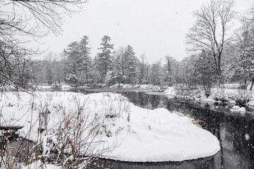 Winter riverscape in park Quebec Canada