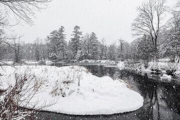 Winter riverscape in park Quebec Canada