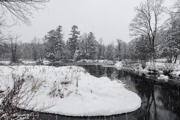 Winter riverscape in park Quebec Canada