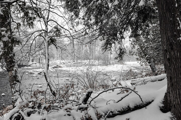 Winter riverscape in park Quebec Canada