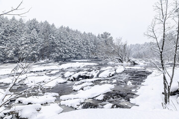 Winter riverscape in park Quebec Canada