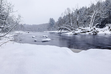 Winter riverscape in park Quebec Canada