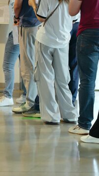 Patients waiting in line at hospital reception. Media
