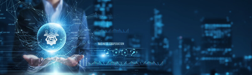 Businessman hands holding business cooperation agreement and partnership data, collaborative...