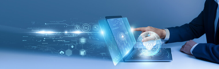 Businessman using laptop and analyze the cloud security system on digital interface. cyber protection, data encryption, secure access, risk management, information safety © AD